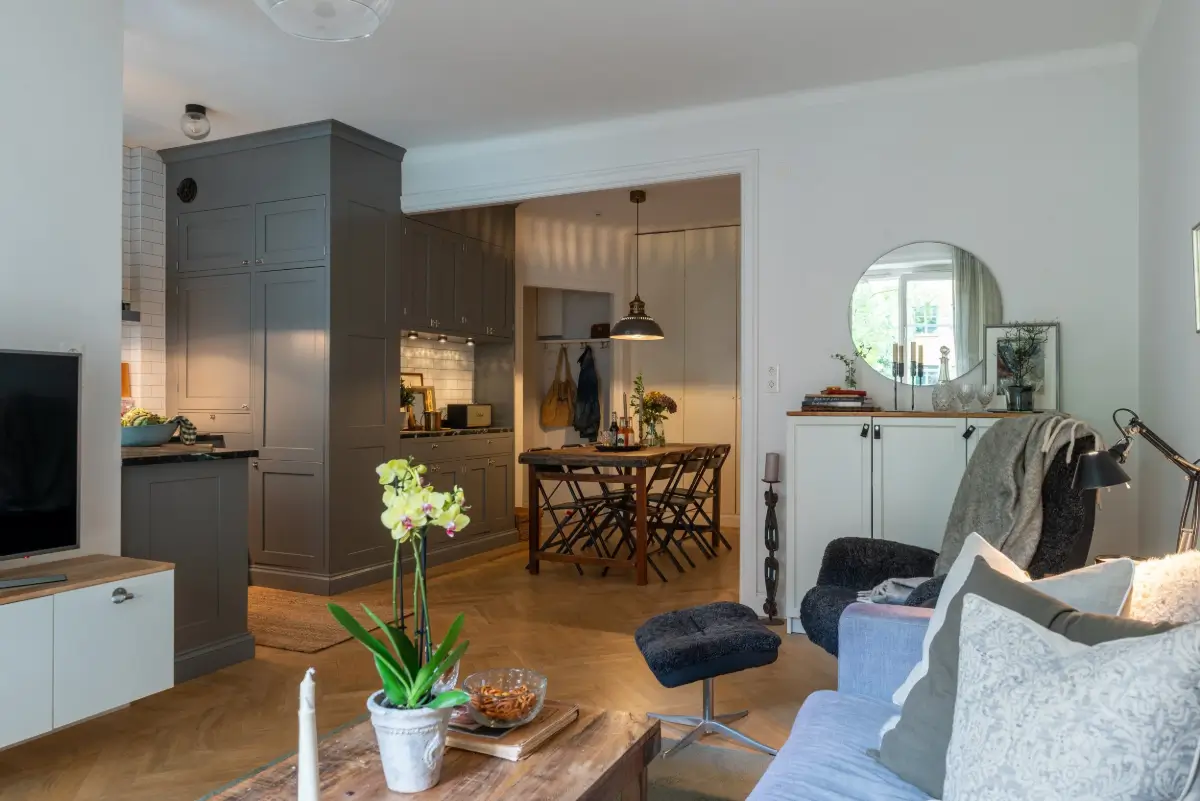 open-plan living space gray kitchen