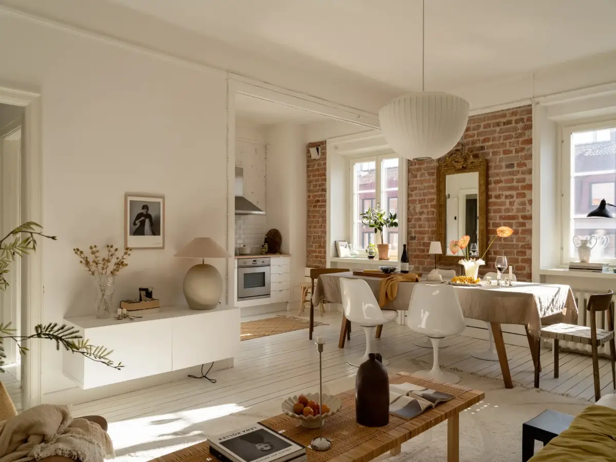 open-plan living space white floorboards