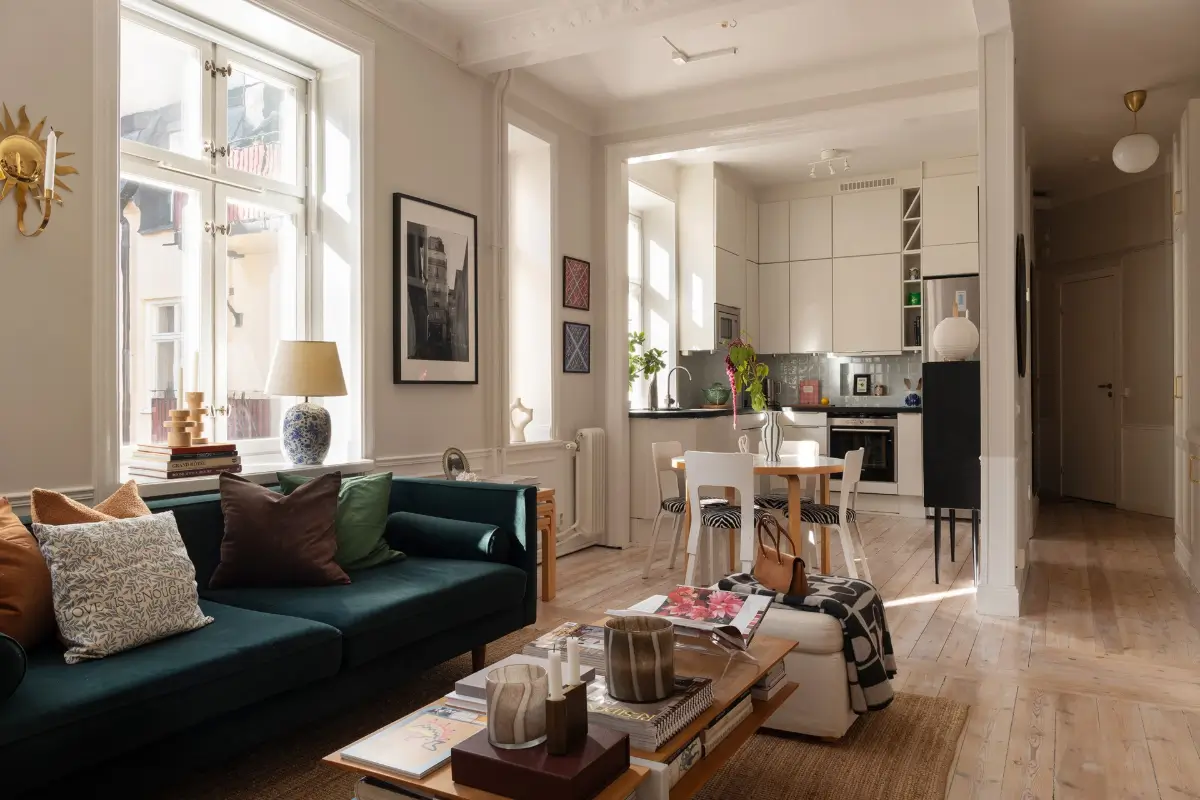 Neutral Tones and Period Character from the 1910s in a Stockholm Apartment 9 open-plan living space wooden floor