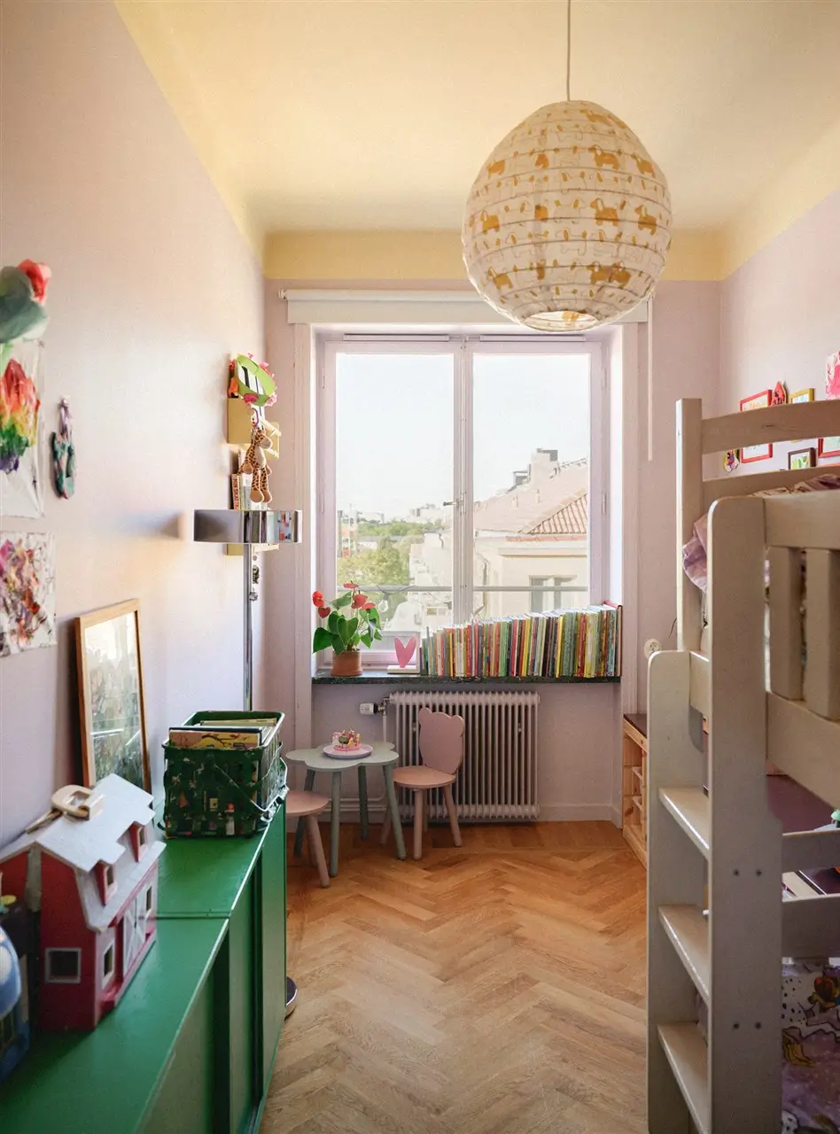 A Colorful Stockholm Family Apartment with Views of the Lake 28 pastel purple and yellow kids bedroom herringbone floor nordroom