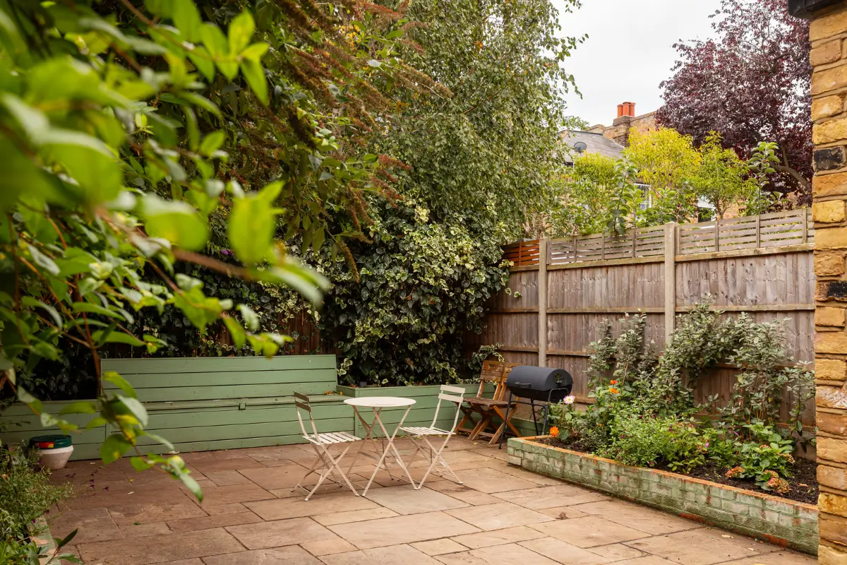 Period Elements and Subtle Color Accents in a Victorian Family Home 27 paved garden