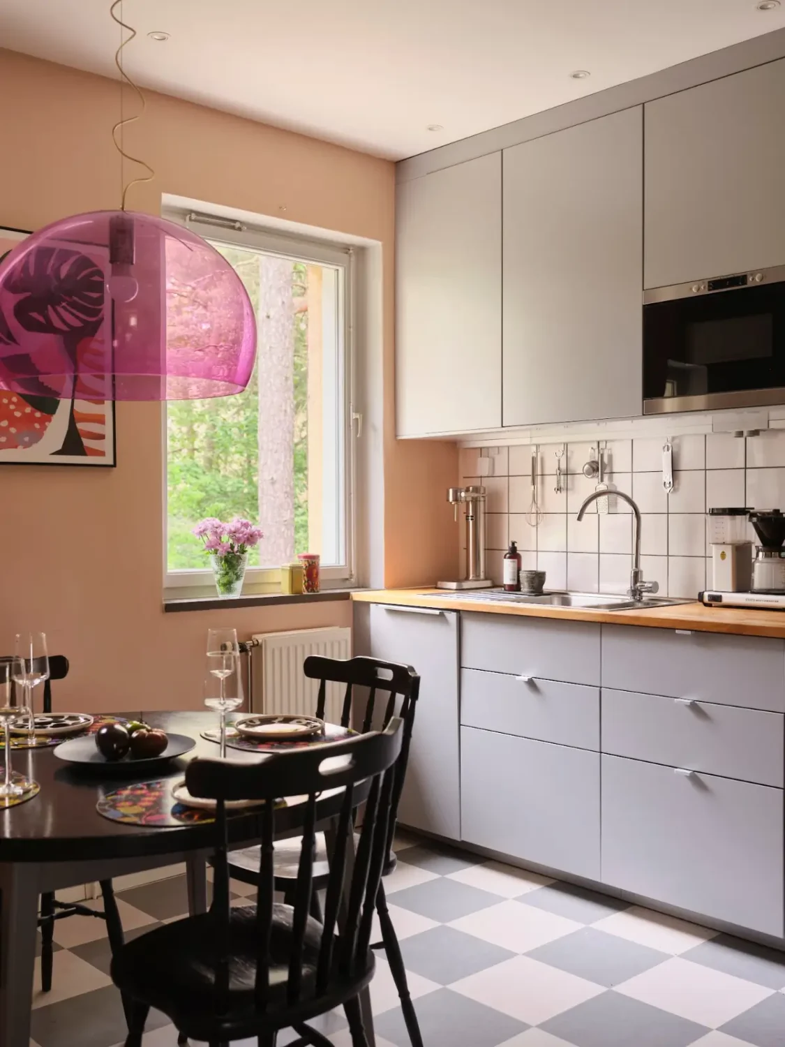 A Natural Color Palette in a Swedish 1940s Apartment 15 pink and gray kitchen