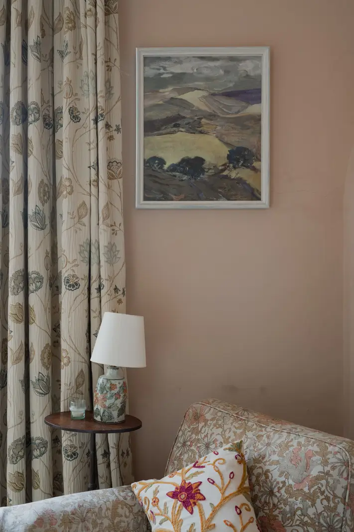 A Charming English Cottage with a Sage-Green Kitchen 13 pink bedroom floral curtains