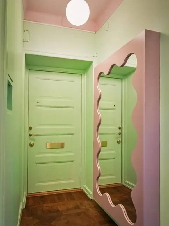 A Colorful Studio Apartment with Gucci Wallpaper 14 pink gustaf westman mirror A Colorful Studio Apartment with Gucci Wallpaper
