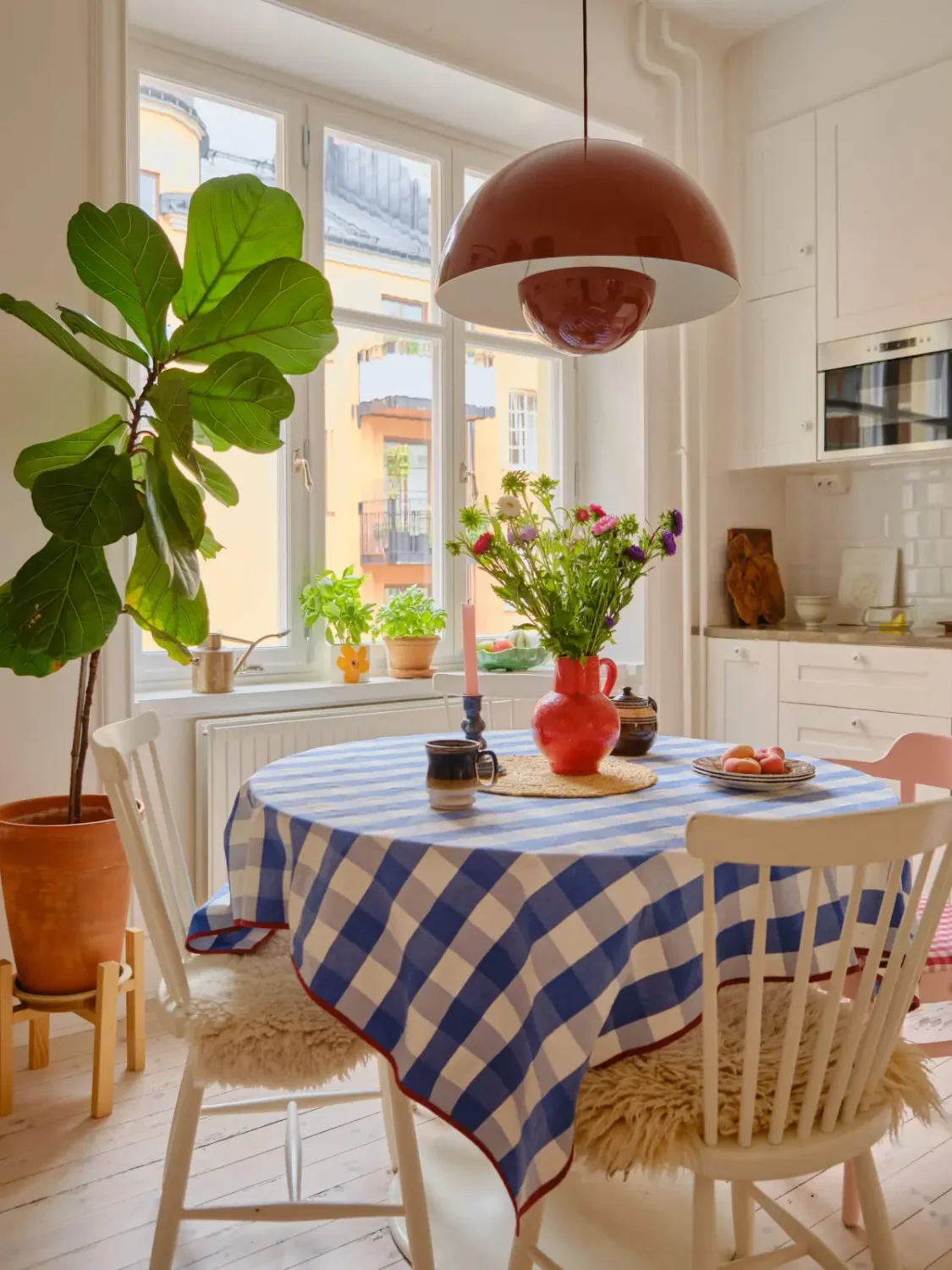 Green and Apricot Rooms in a Charming Stockholm Apartment 15 round kitchen table checkered tablecloth