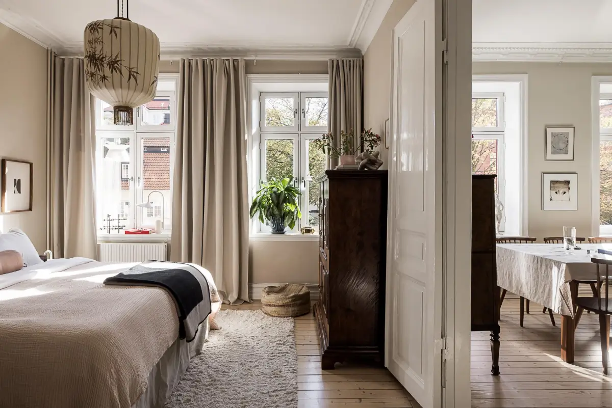 Warm Neutral Tones and Period Features in a Swedish Apartment 13 scandi bedroom large windows