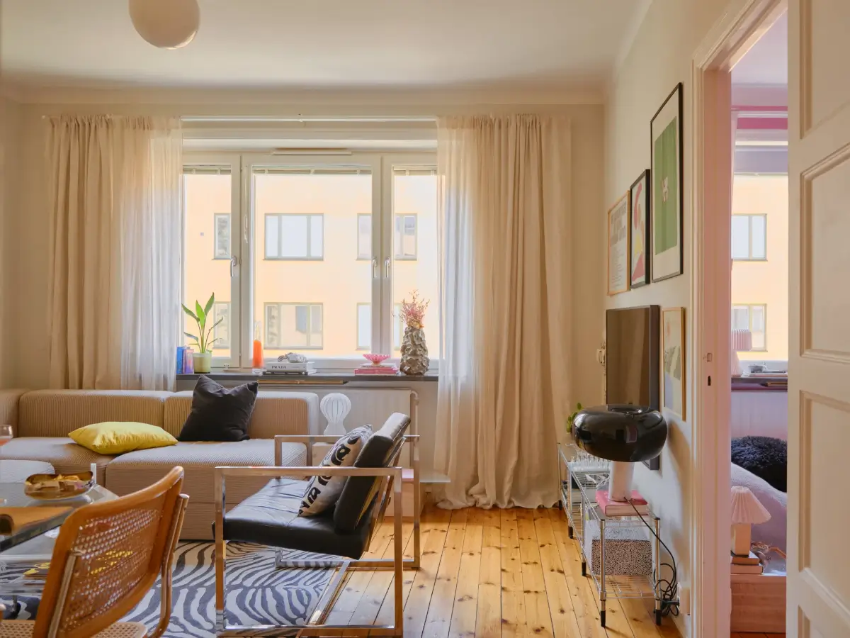 A Light 1930s Apartment with a Bubblegum Pink Bedroom 2 scandi living room beige walls wooden floor