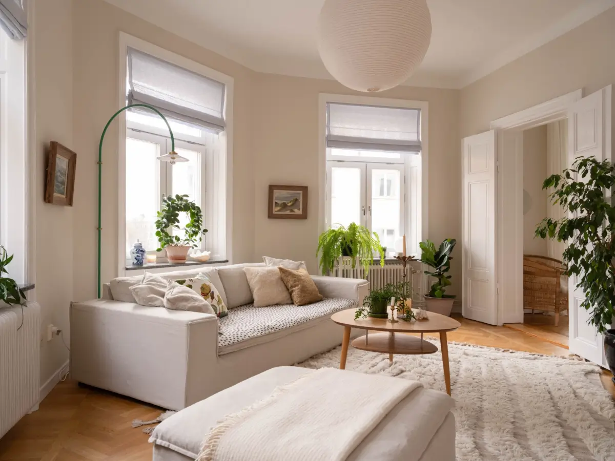 A Light and Spacious Corner Apartment in a 19th-Century Building 1 serene corner living room large windows