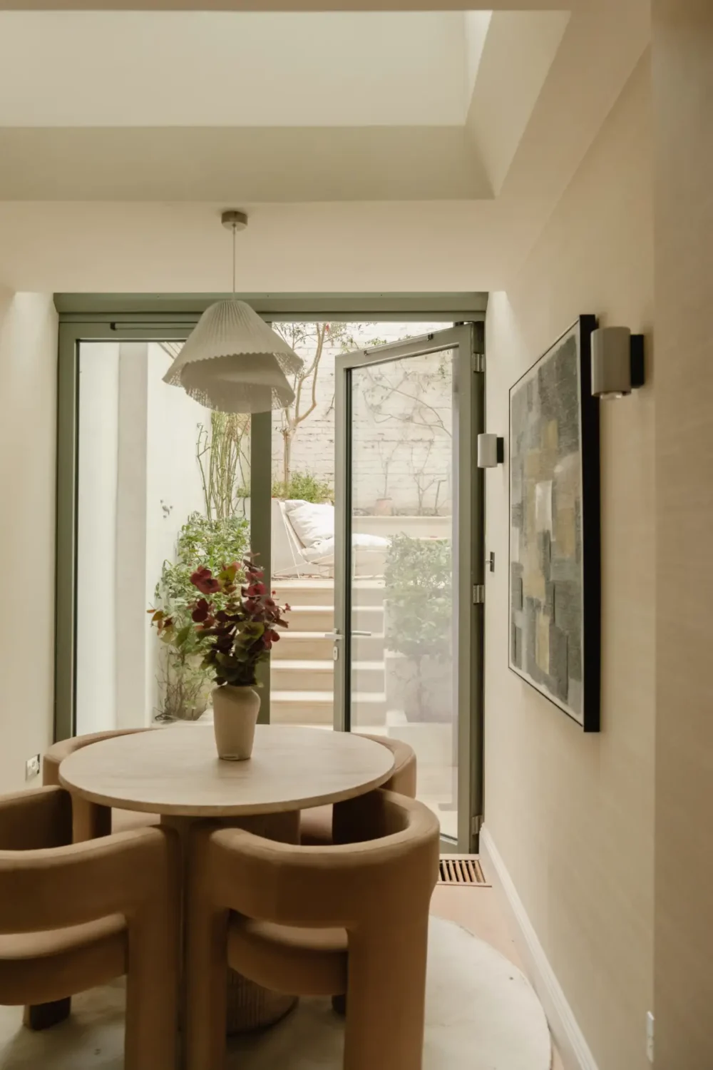 A Serene Duplex Apartment with a Glass Extension in London 11 small dining room