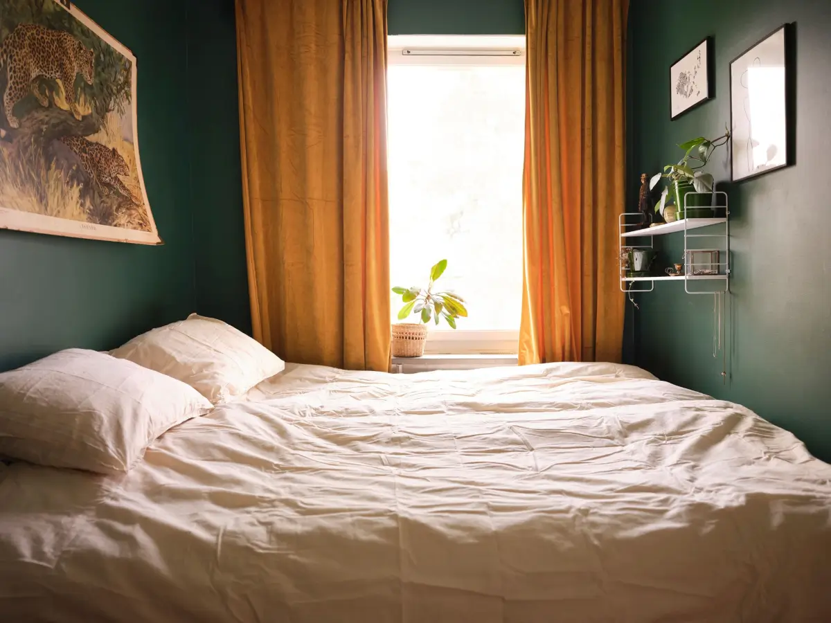 A Natural Color Palette in a Swedish 1940s Apartment 9 small forest green bedroom