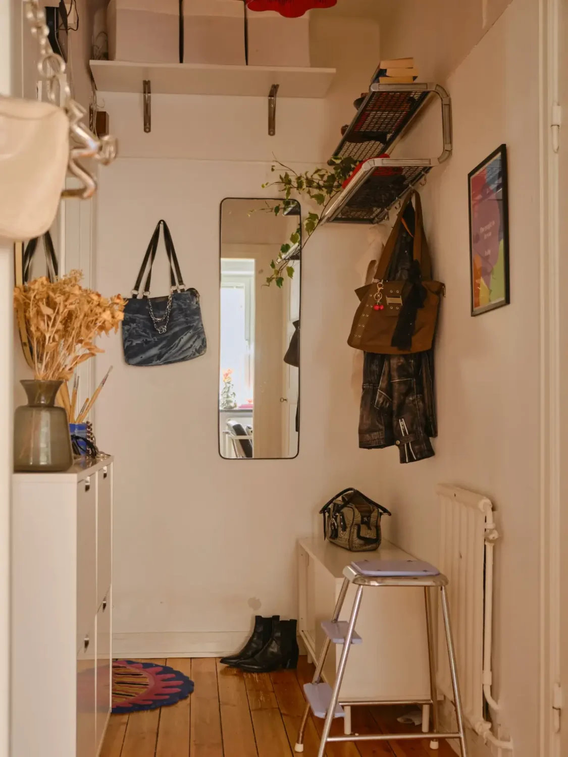 A Light 1930s Apartment with a Bubblegum Pink Bedroom 27 small hall storage shelves shoe cabinet A Light 1930s Apartment with a Bubblegum Pink Bedroom