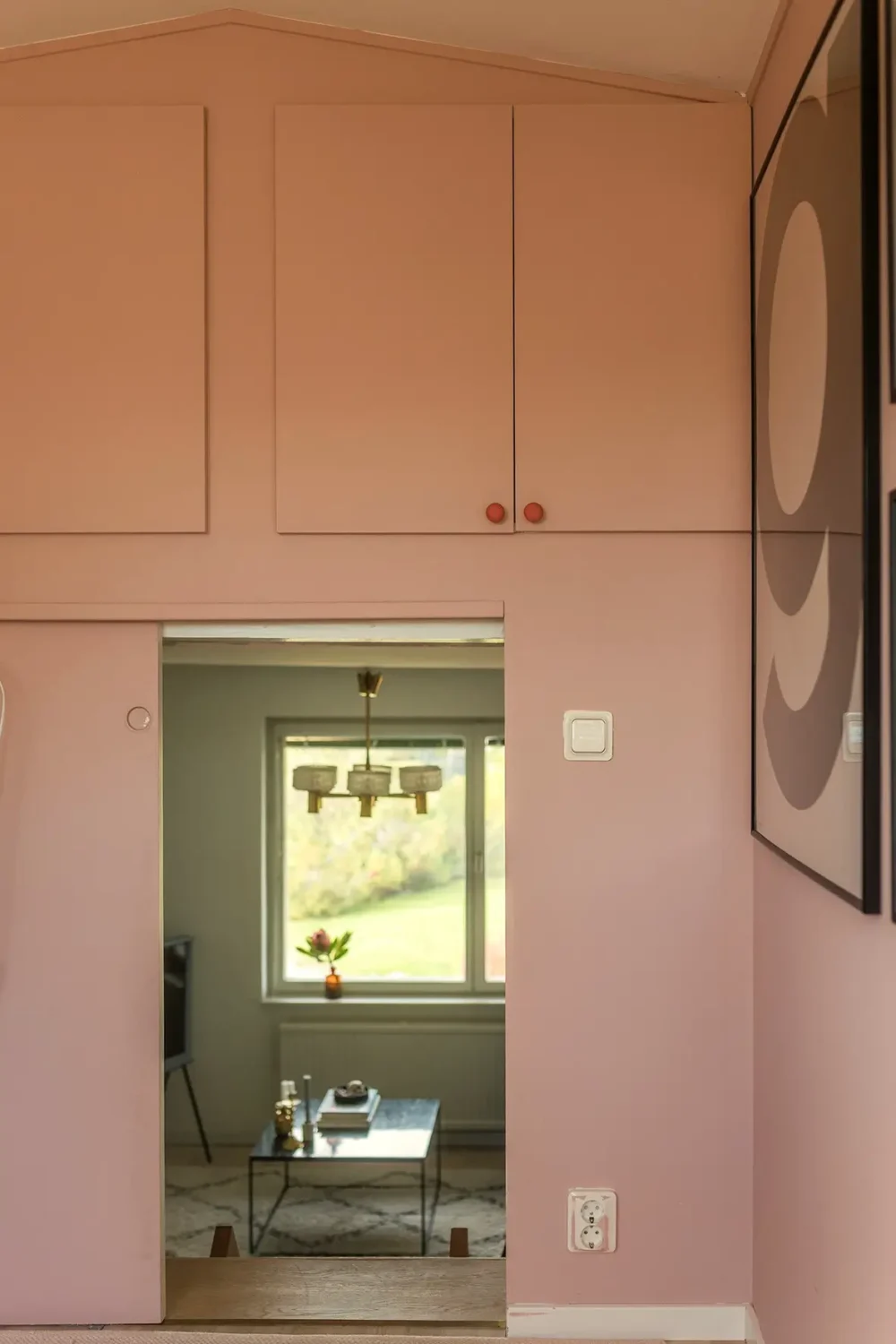 A Charming 1960s Family Home in Stockholm 17 small pink room with built-in cabinets