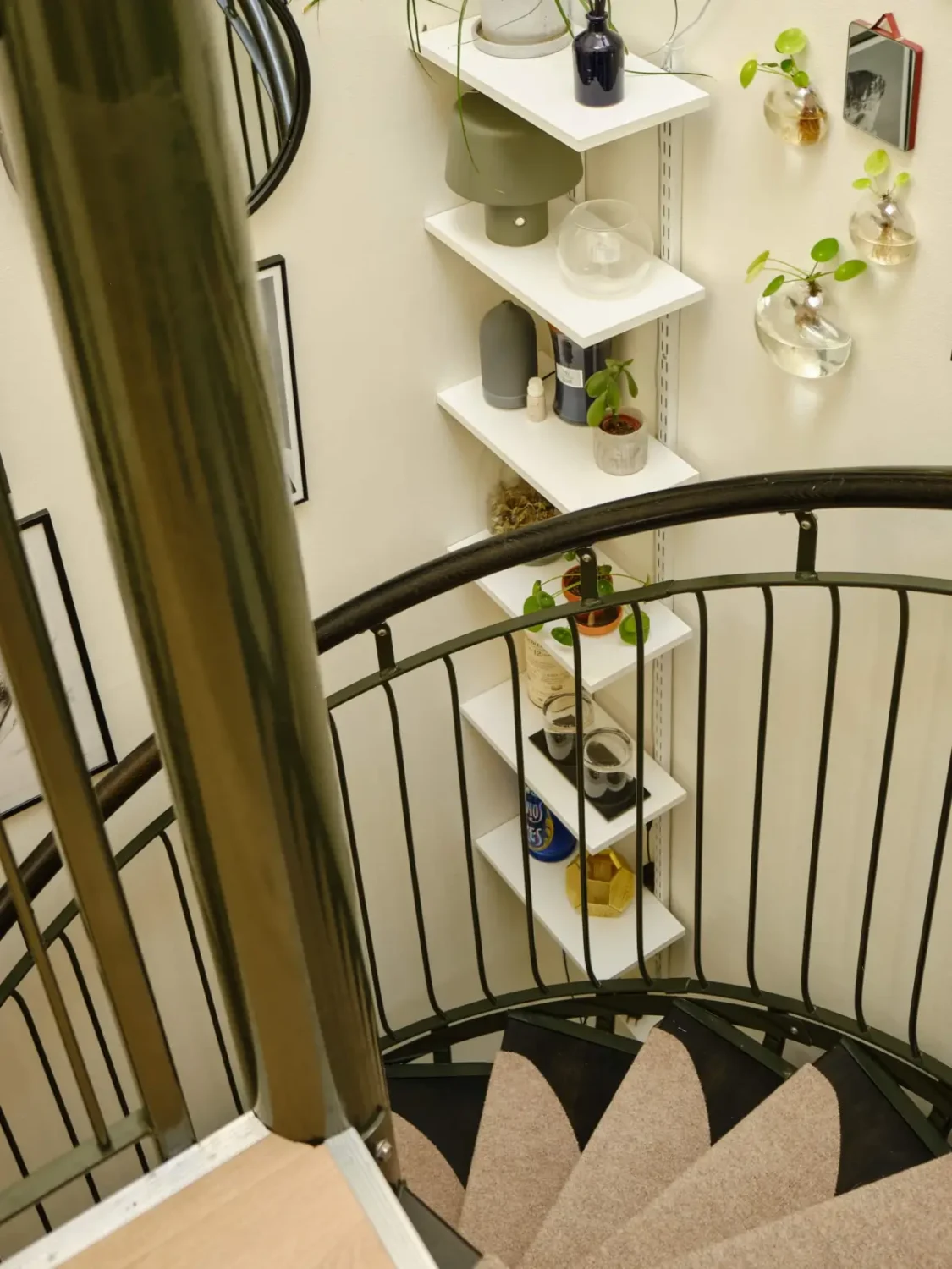 Former Stables Transformed into a Modern, Light House with Plaster Walls 9 spiral staircase