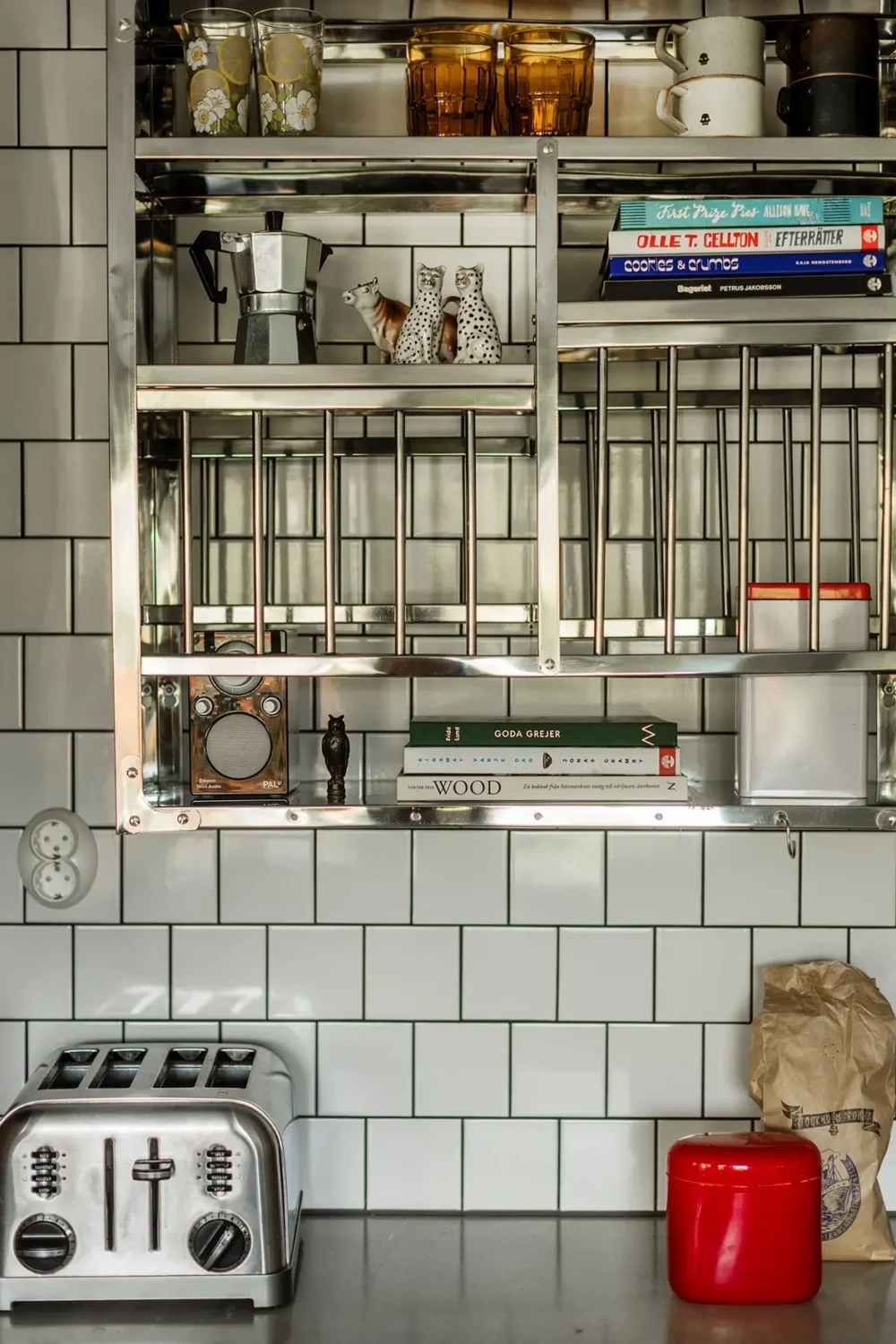 A Charming 1960s Family Home in Stockholm 9 stainless steel shelving system