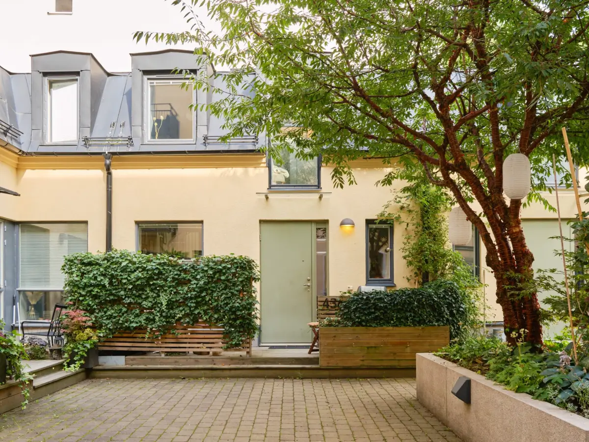 Former Stables Transformed into a Modern, Light House with Plaster Walls 26 swedish courtyard terrace house Former Stables Transformed into a Modern, Light House with Plaster Walls