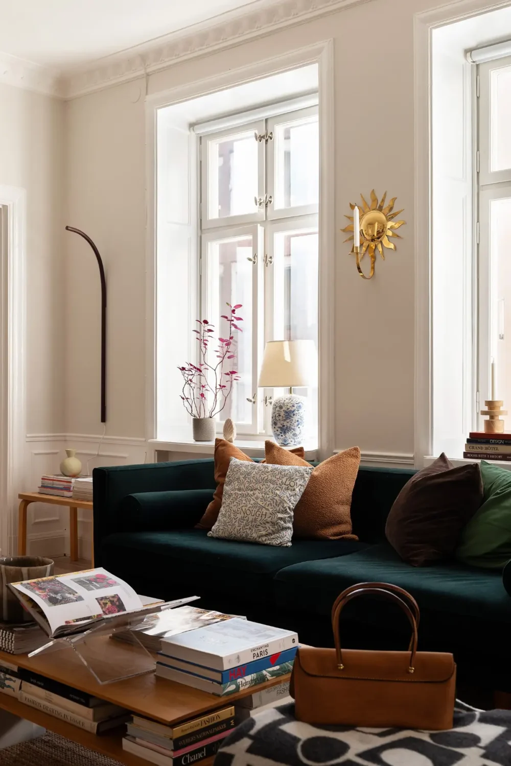 Neutral Tones and Period Character from the 1910s in a Stockholm Apartment 2 velvet green sofa