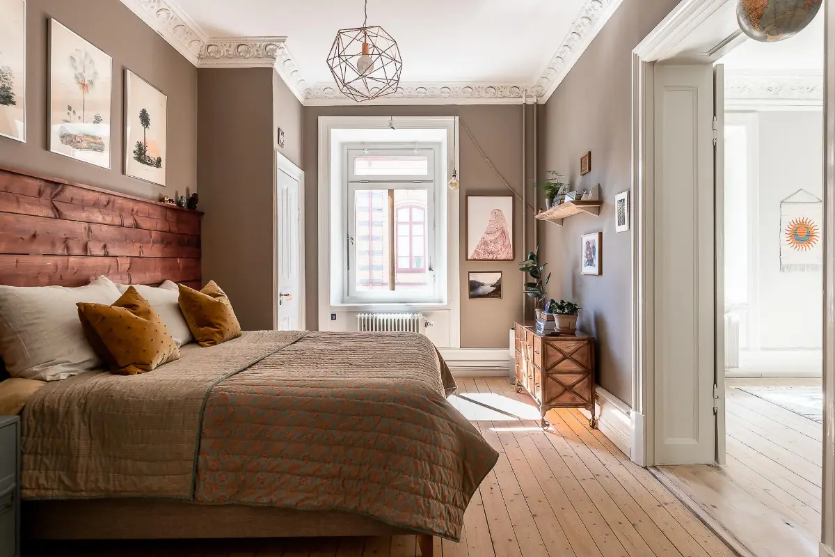 The Color Trends for 2026: A Return to Nature, Balance, and Grounding 14 warm-neutral-bedroom-wooden-floor-wood-stained-headboard-color-trends-2026-nordroom