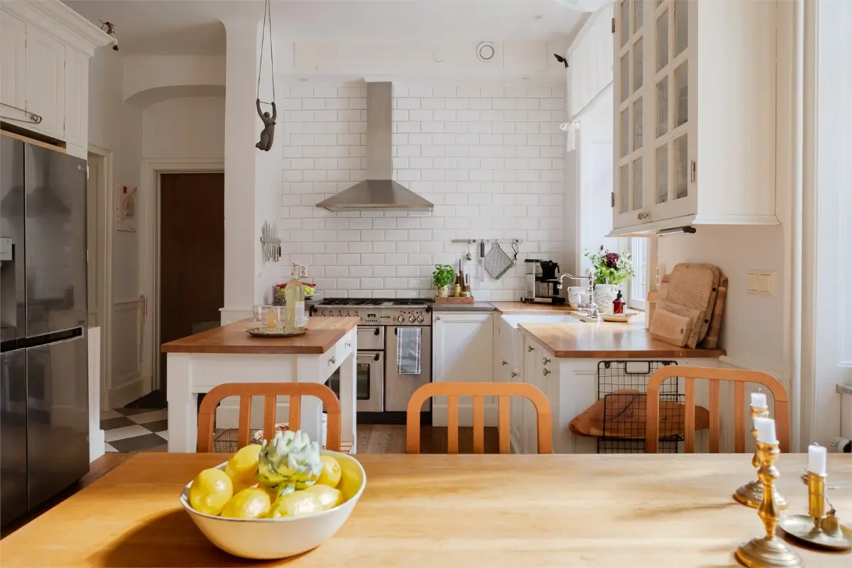 A Light-Filled Stockholm Apartment with a Charming Kitchen 7 vwhite kitchen