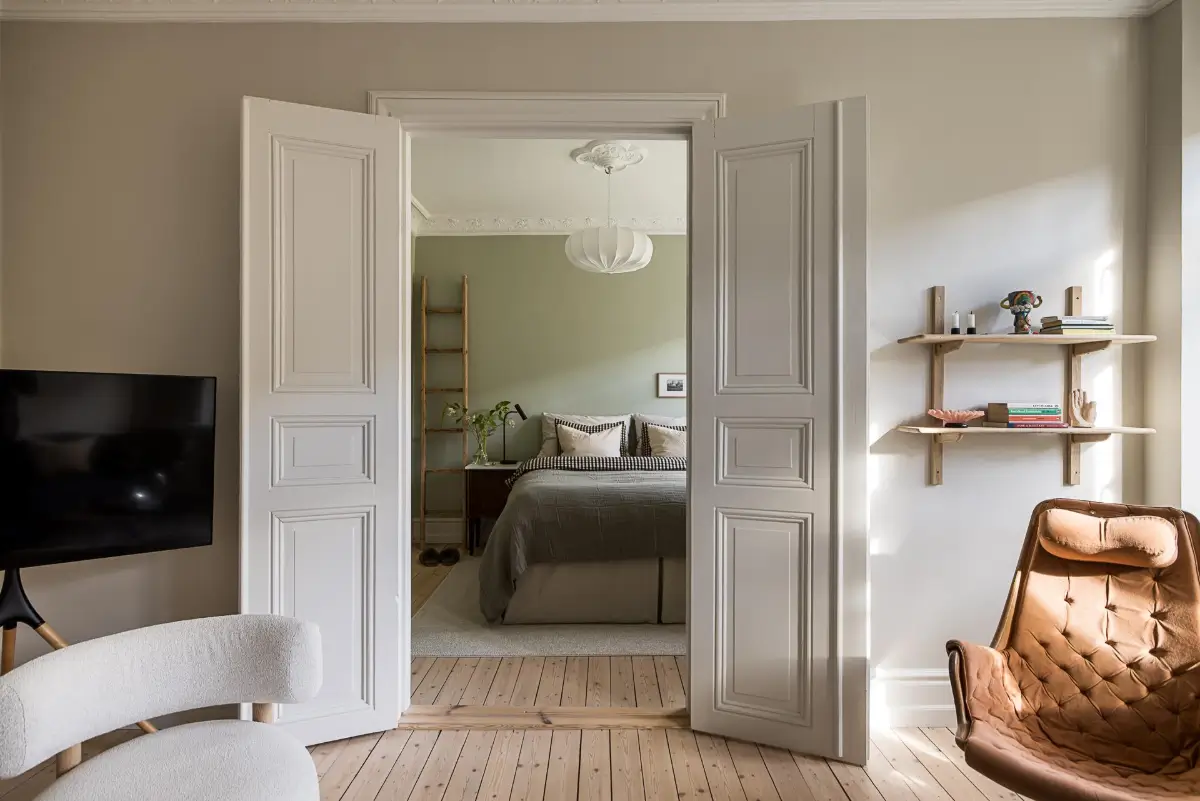 A Classic Renovated Apartment with a Social Light Green Kitchen 10 wooden doors bedroom