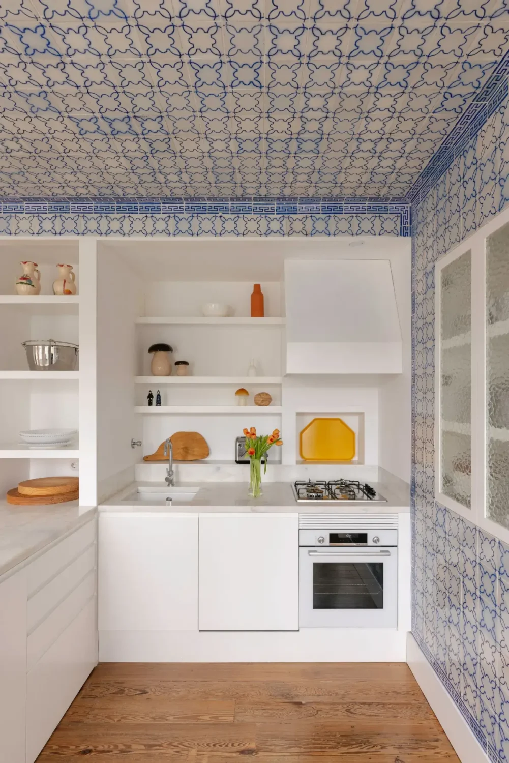 27 Statement Ceiling Ideas That Will Spruce Up Any Room 34 blue-tiled-ceiling-white-kitchen-statement-ceilings-nordroom