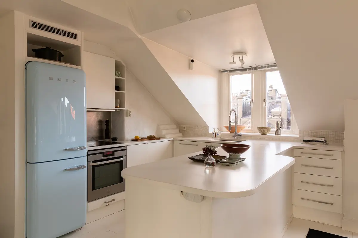 A Bright and Open-Plan Attic Apartment with Exposed Beams 11 bright-attic-apartment-stockholm-nordroom17