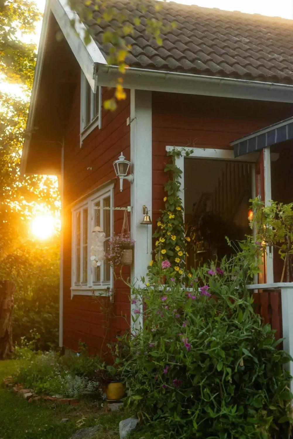 A Charming Swedish Cottage Decorated with Bold Colors and a Lush Garden 1 charming-country-holiday-cottage-sweden-nordroom