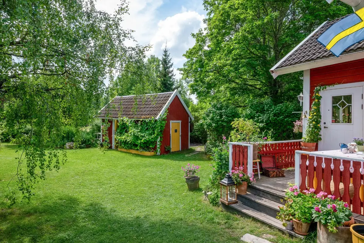 A Charming Swedish Cottage Decorated with Bold Colors and a Lush Garden 39 charming-country-holiday-cottage-sweden-nordroom20