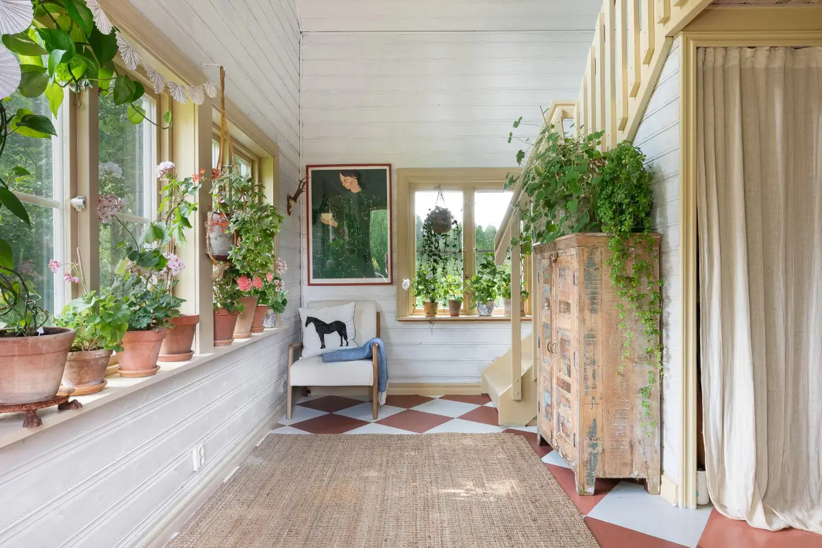A Charming Swedish Cottage Decorated with Bold Colors and a Lush Garden 2 charming-country-holiday-cottage-sweden-nordroom38