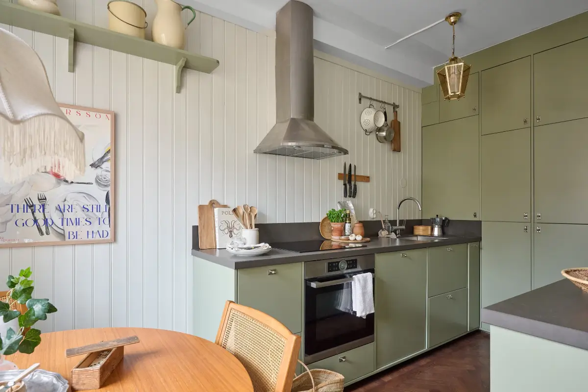 green kitchen paneled walls