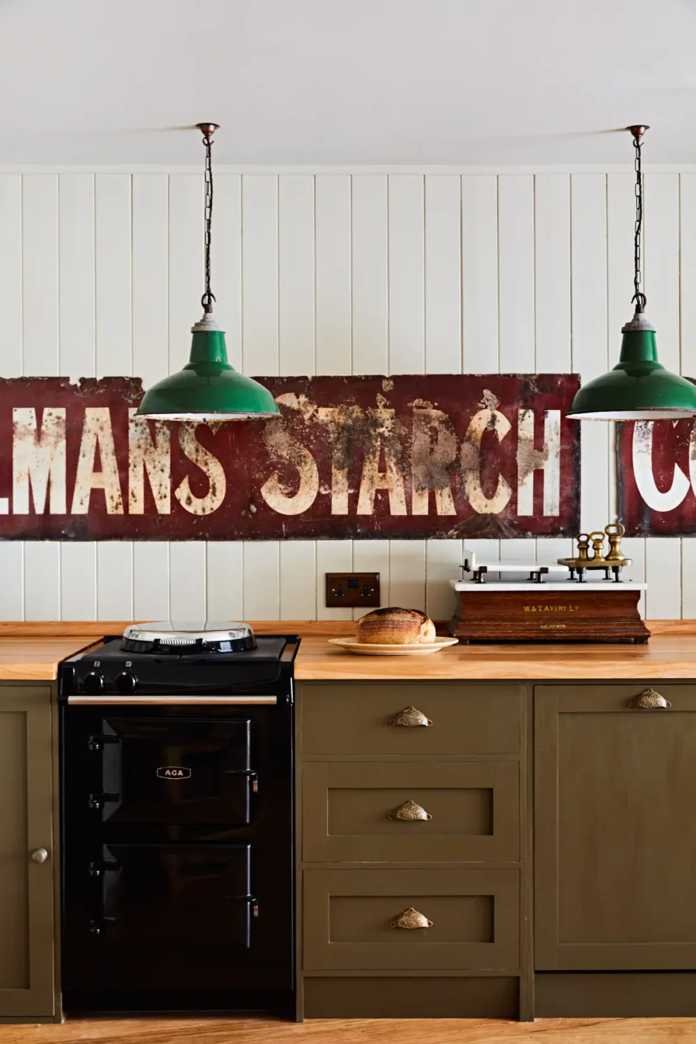Natural Materials and Green Tones in a Pretty Coastal Home 3 kitchen-farrow-ball-pantalon-nordroom