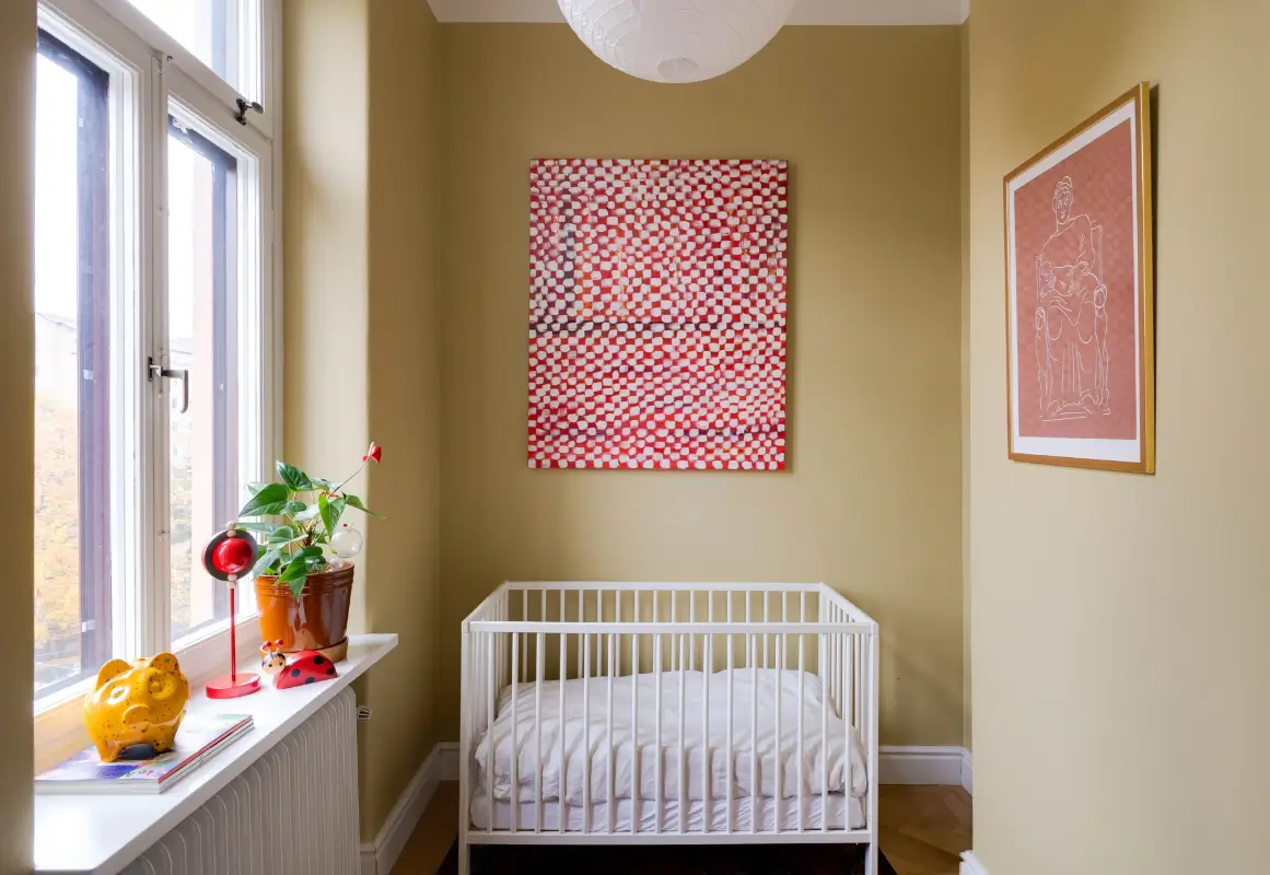 Classic Elements and Modern Comforts in an Elegant Apartment 8 ochre nursery