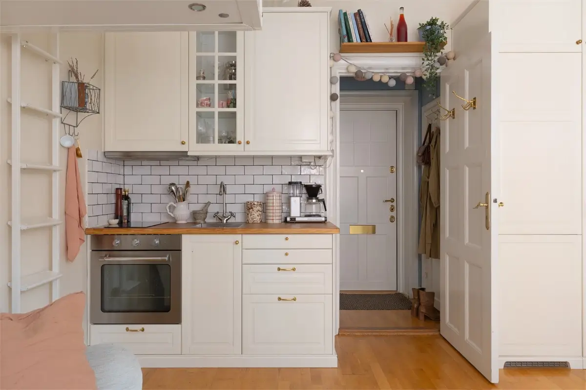 A Studio Apartment with a Large Bay Window and a Loft Bed 11 small-studio-apartment-bay-window-loft-bed-nordroom11