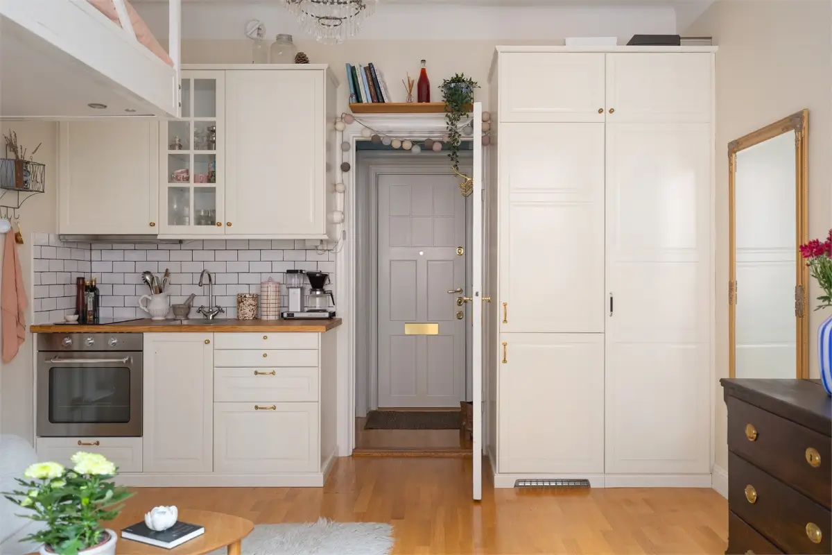 A Studio Apartment with a Large Bay Window and a Loft Bed 9 small-studio-apartment-bay-window-loft-bed-nordroom7