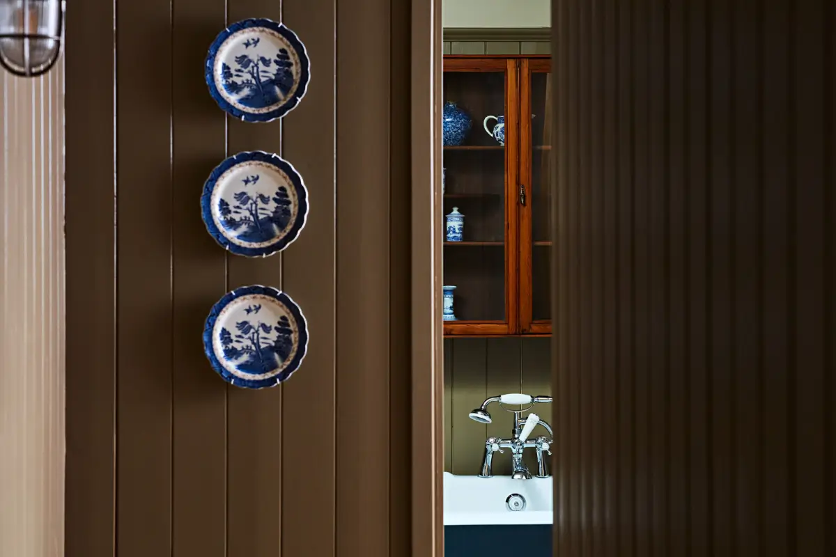 Natural Materials and Green Tones in a Pretty Coastal Home 21 tongue and groove paneling