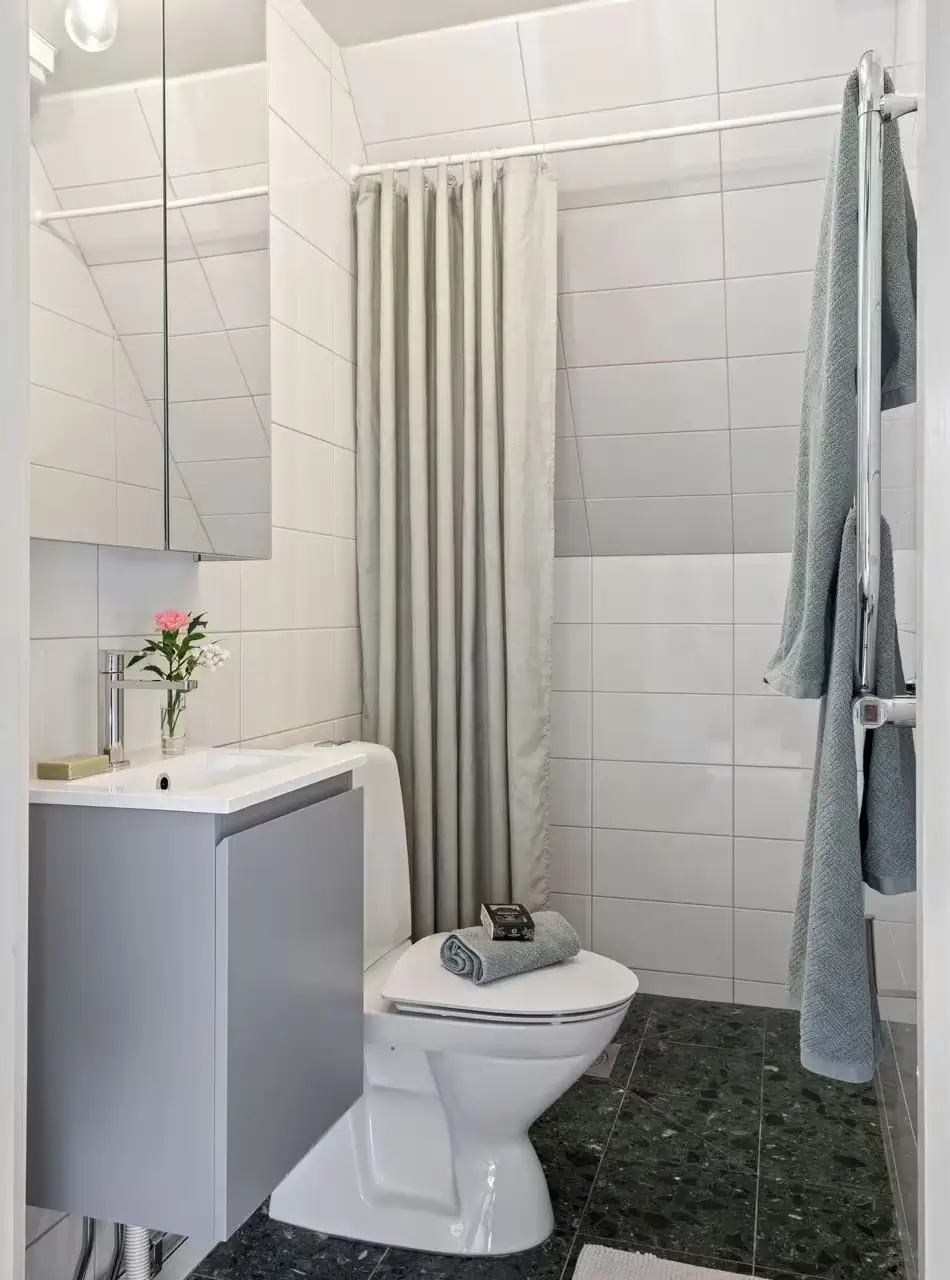 A Light-Filled Attic Apartment with Exposed Beams 18 light-attic-apartment-sweden-nordroom