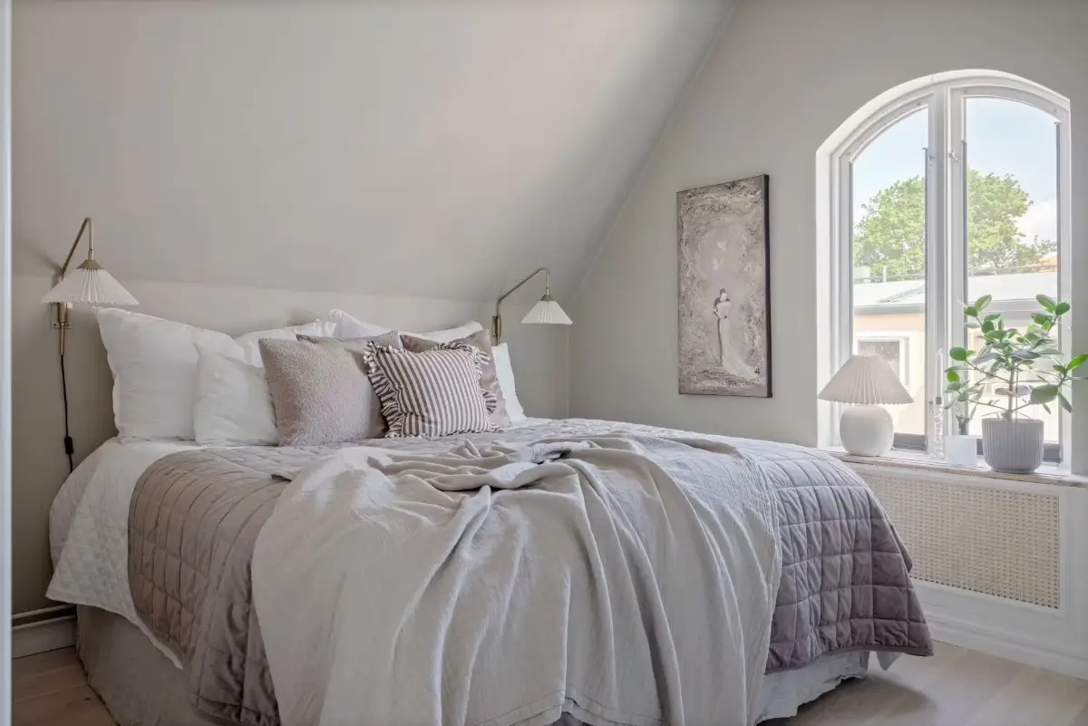 A Light-Filled Attic Apartment with Exposed Beams 14 light-attic-apartment-sweden-nordroom