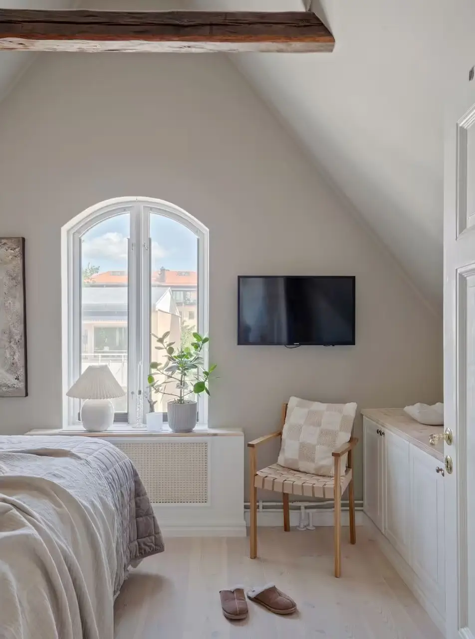 A Light-Filled Attic Apartment with Exposed Beams 13 light-attic-apartment-sweden-nordroom