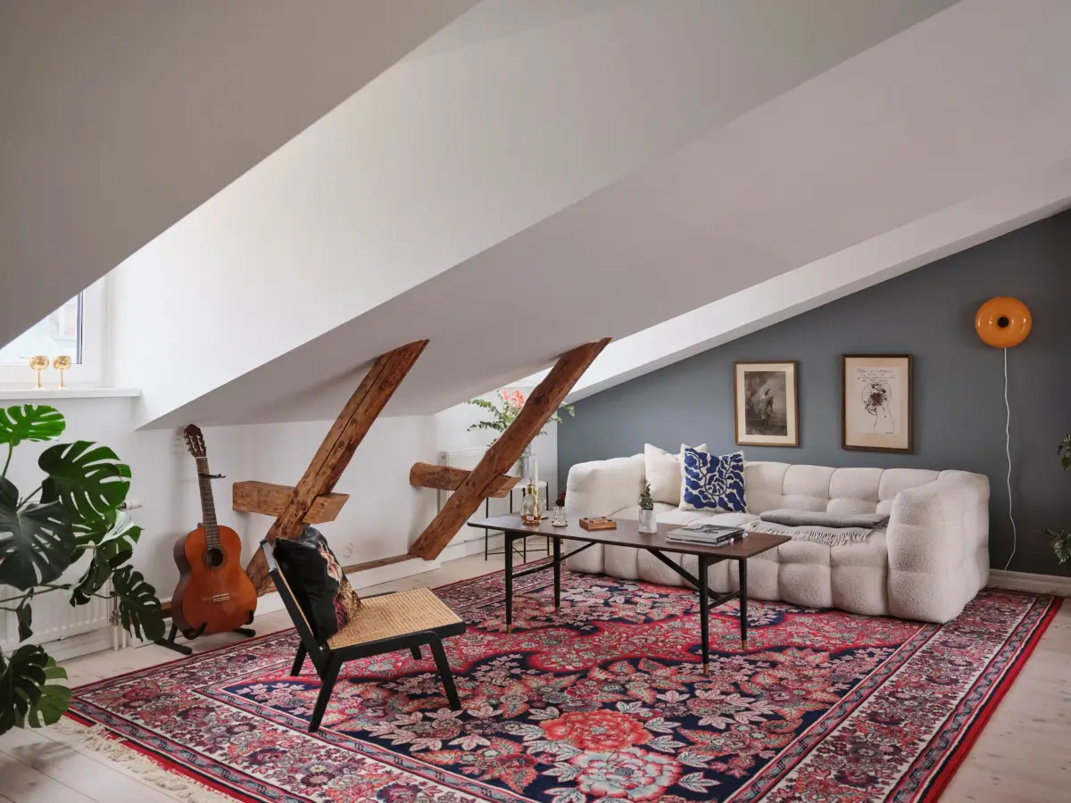 A Modern Attic Apartment with Exposed Beams in a 19th Century Building 2 scandinavian-attic-apartment-wooden-beams-slanted-ceilings-nordroom