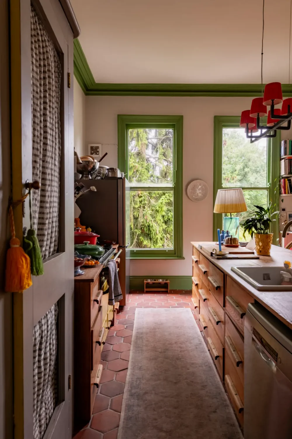 Best of 2025: Kitchens 49 wooden kitchen terracotta floor green window frames best of 2025 kitchens nordroom Best of 2025: Kitchens