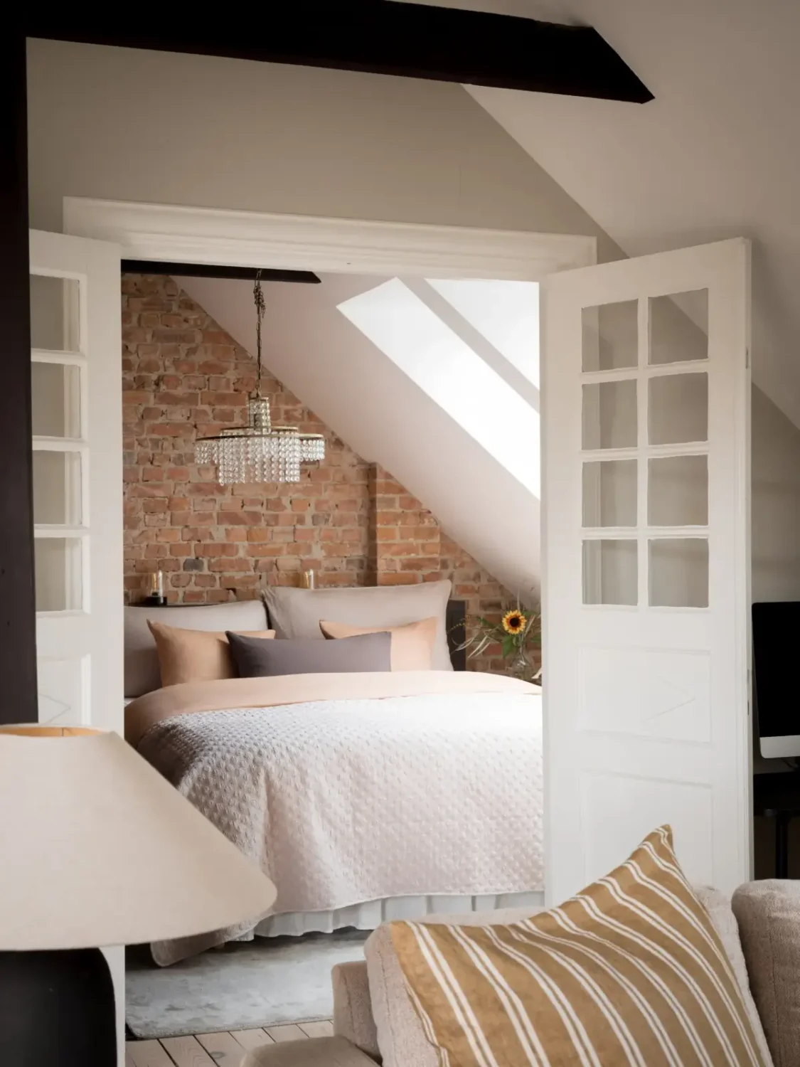 A Renovated Duplex Apartment with a Roof Terrace 15 scandi-duplex-apartment-exposed-beams-brick-nordroom