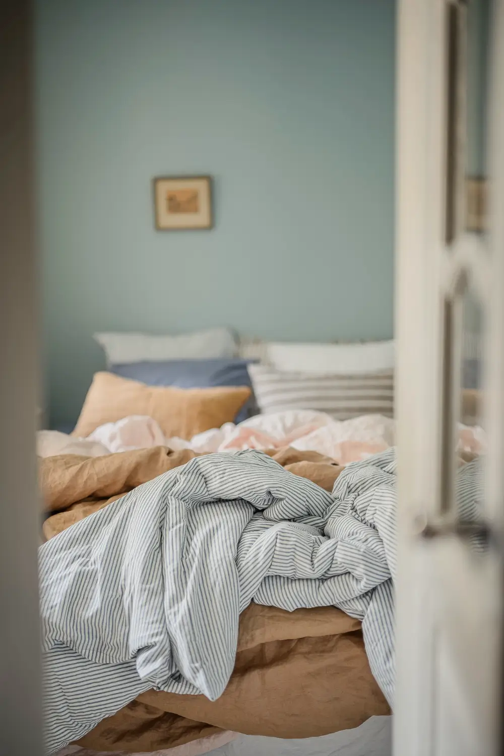 A Narrow Scandinavian Apartment with a Charming Blue Bedroom 8 turn-of-the-century-scandinavian-apartment-nordroom