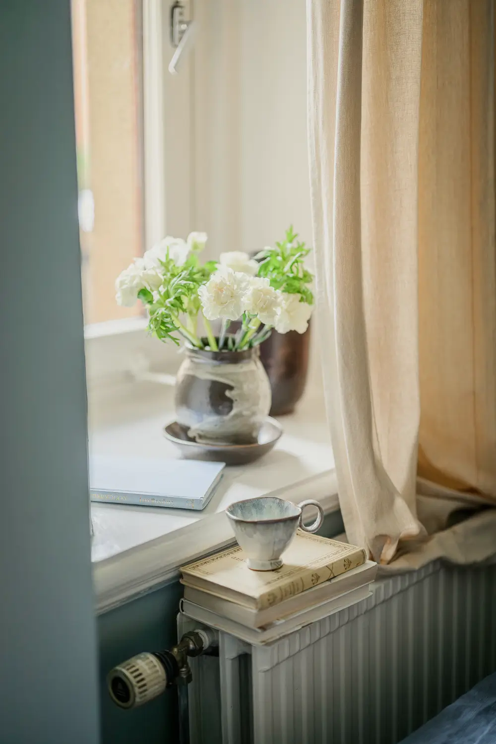 A Narrow Scandinavian Apartment with a Charming Blue Bedroom 10 turn-of-the-century-scandinavian-apartment-nordroom