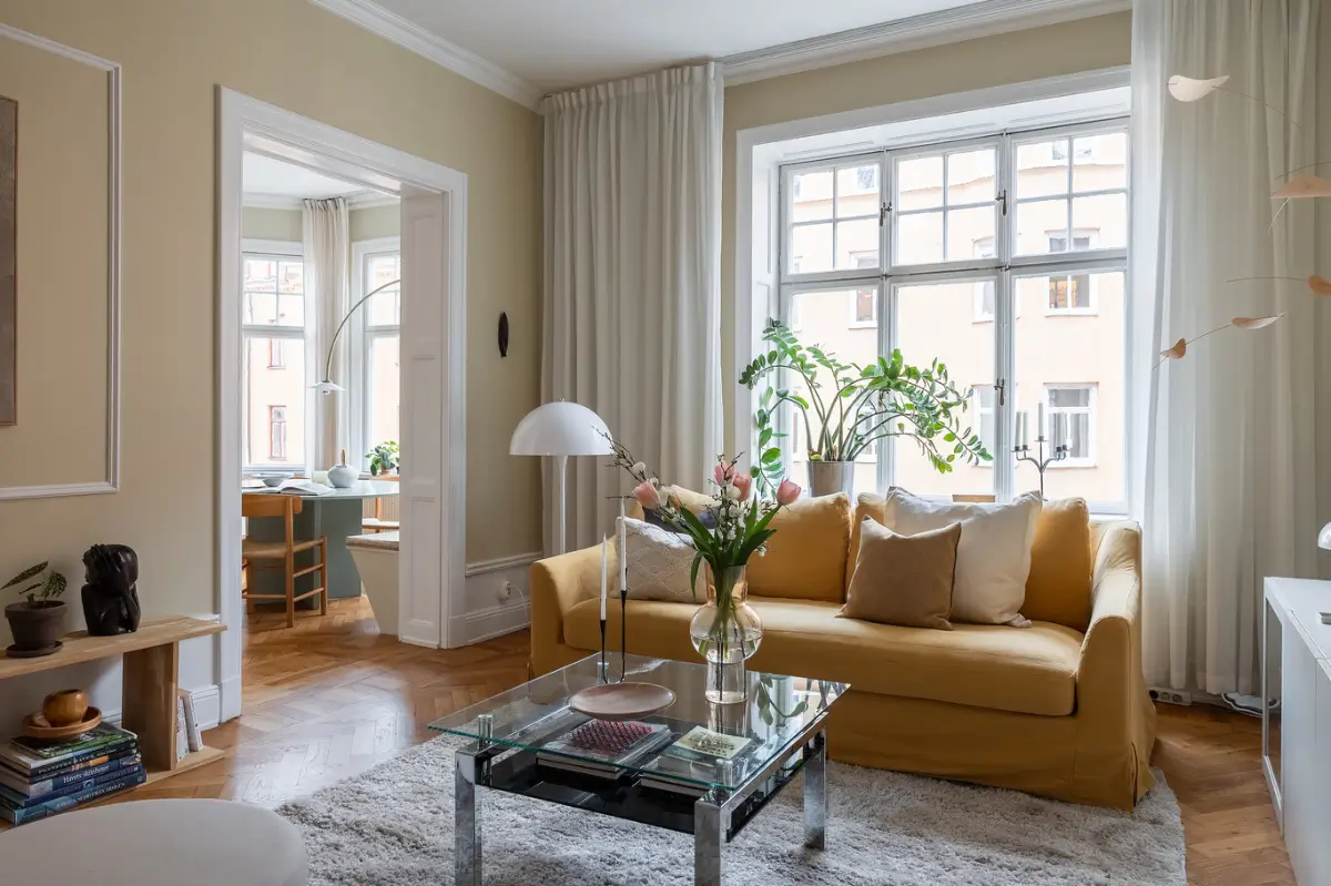 Warm Beige Tones and a Stylish Kitchen in a Stockholm Apartment 7 early-20th-century-apartment-beautiful-kitchen-and-fireplace