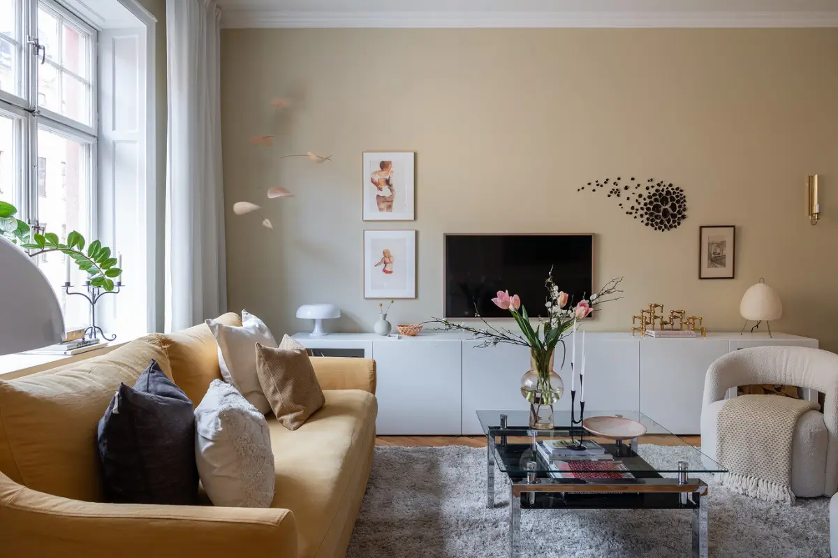 Warm Beige Tones and a Stylish Kitchen in a Stockholm Apartment 2 early-20th-century-apartment-beautiful-kitchen-and-fireplace