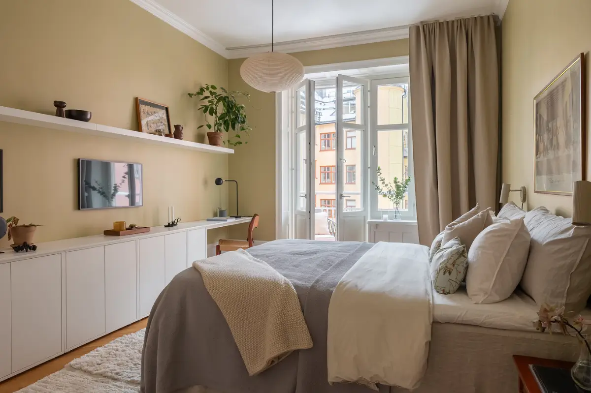 Warm Beige Tones and a Stylish Kitchen in a Stockholm Apartment 20 early-20th-century-apartment-beautiful-kitchen-and-fireplace