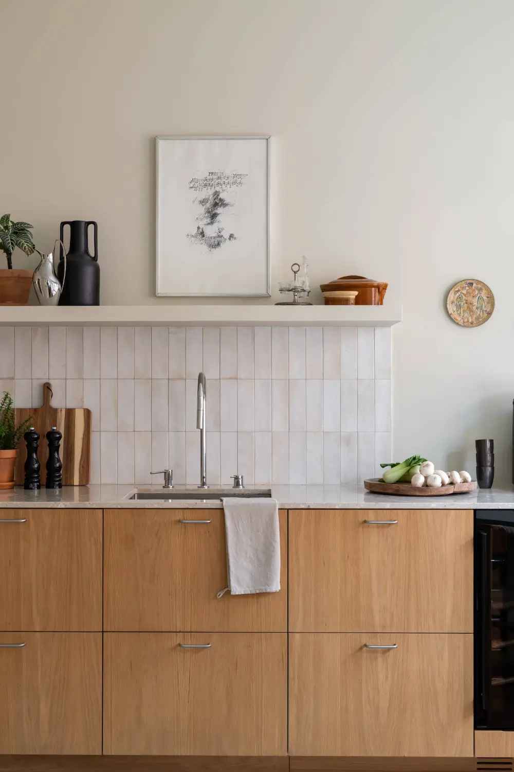 Warm Beige Tones and a Stylish Kitchen in a Stockholm Apartment 15 early-20th-century-apartment-beautiful-kitchen-and-fireplace