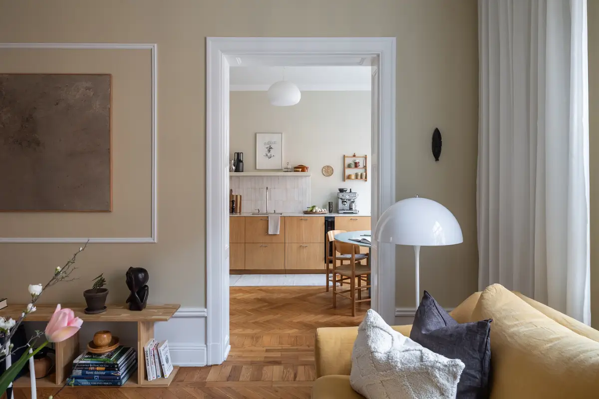 Warm Beige Tones and a Stylish Kitchen in a Stockholm Apartment 8 early-20th-century-apartment-beautiful-kitchen-and-fireplace