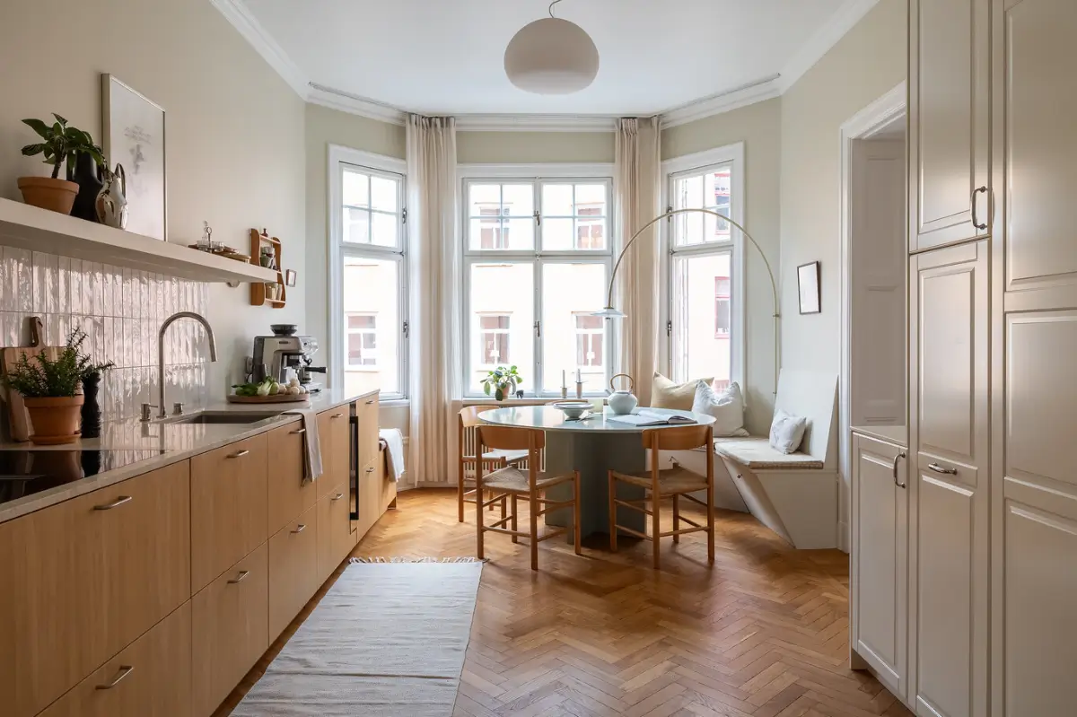 Warm Beige Tones and a Stylish Kitchen in a Stockholm Apartment 11 early-20th-century-apartment-beautiful-kitchen-and-fireplace