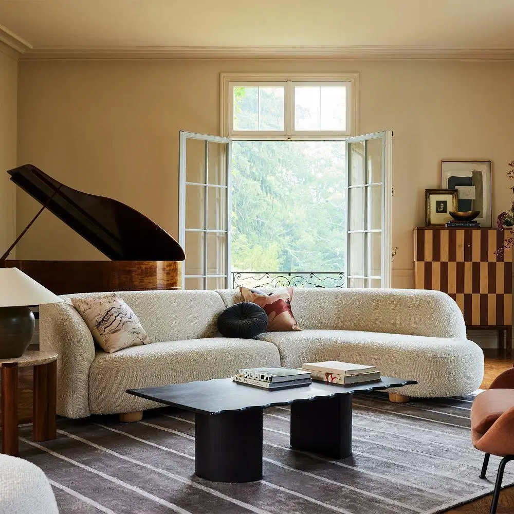 10 Sofa Trends for 2026: The Year the Couch Became the Main Character 11 laurent 2 piece wedge chaise sectional west elm sofa trends 2026 nordroom 10 Sofa Trends for 2026: The Year the Couch Became the Main Character