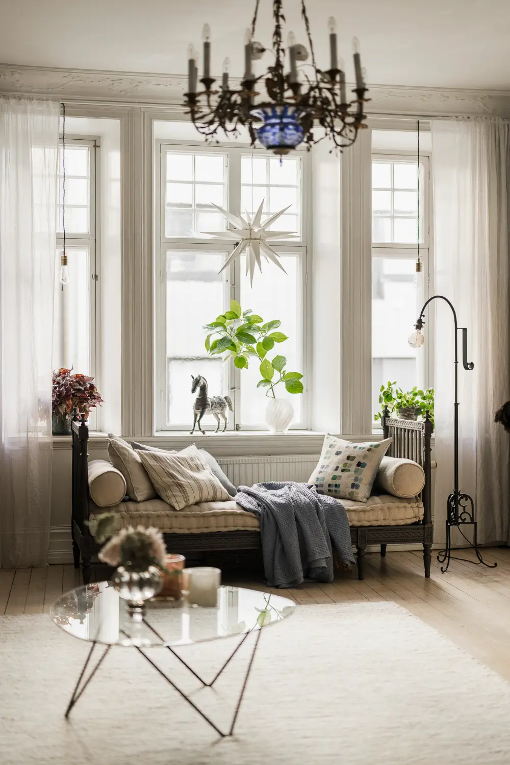 Large Windows, Period Character, and a Charming Kitchen in a Swedish Apartment 2 period-features-thoughtful-updates-scandinavian-apartment-nordroom
